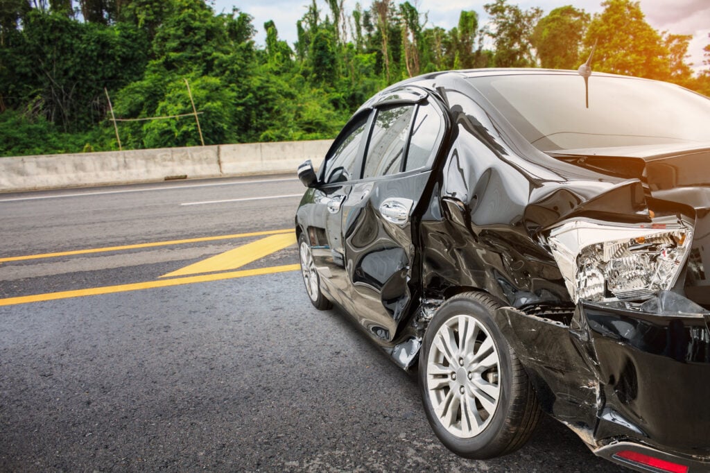 Damaged car after a roadway crash