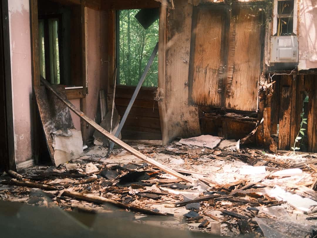 Rochester house fire scene where resident was severely burned and family displaced.