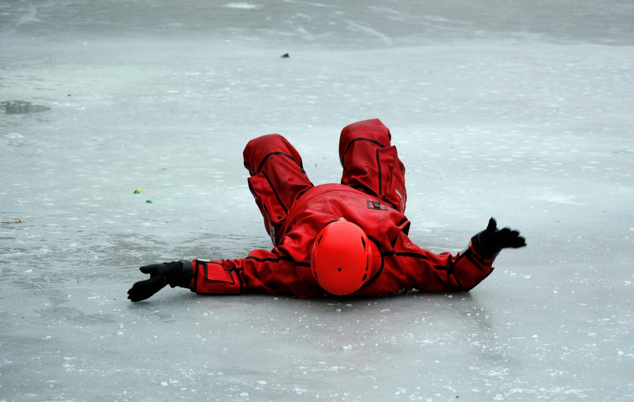 Person slipping on icy surface, illustrating a slip and fall accident.