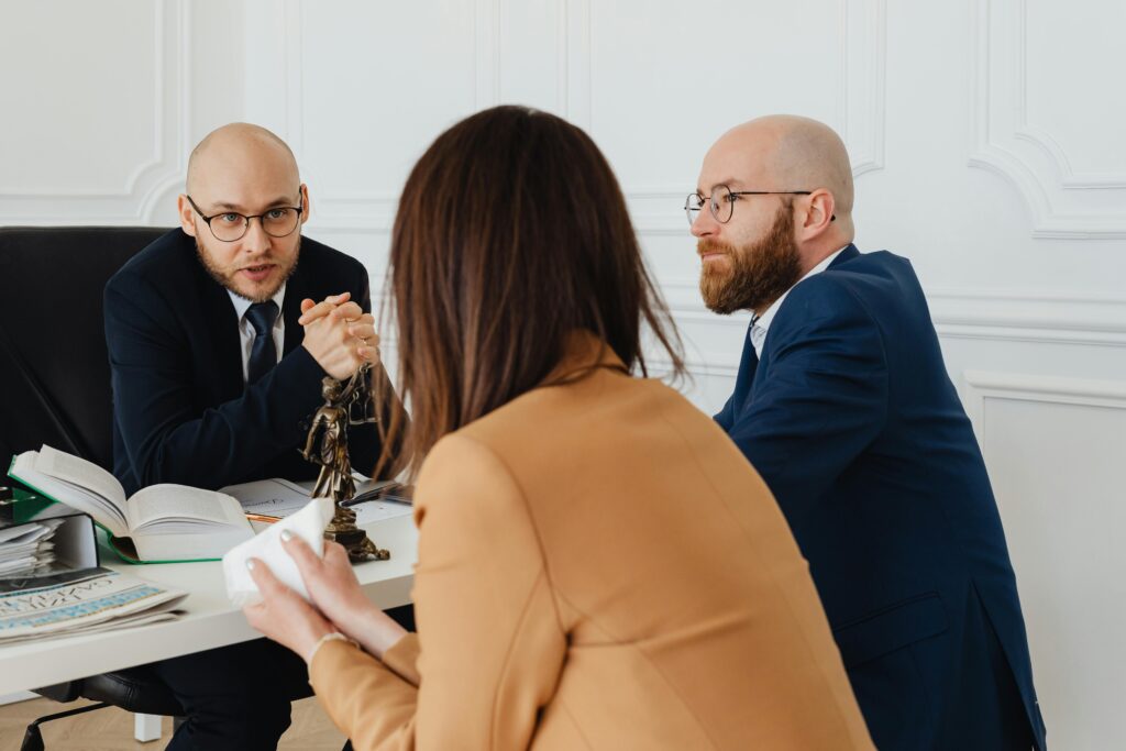 Fetal Distress lawyer consulting clients in New York office during legal case discussion