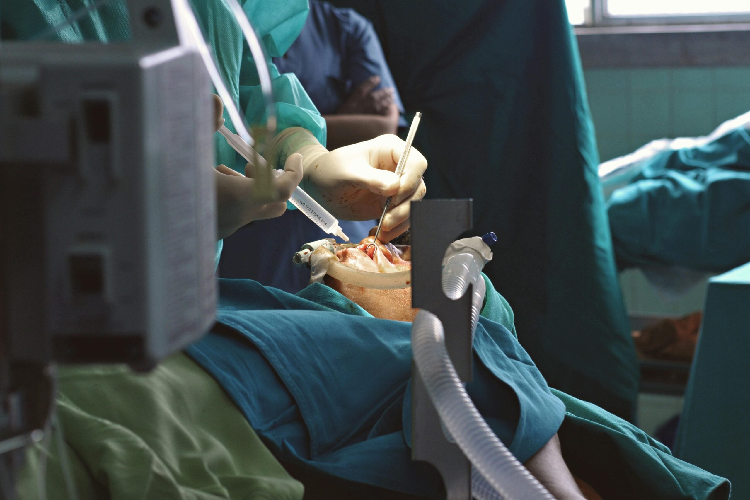 New York medical malpractice lawyer reviewing surgical negligence in hospital setting.