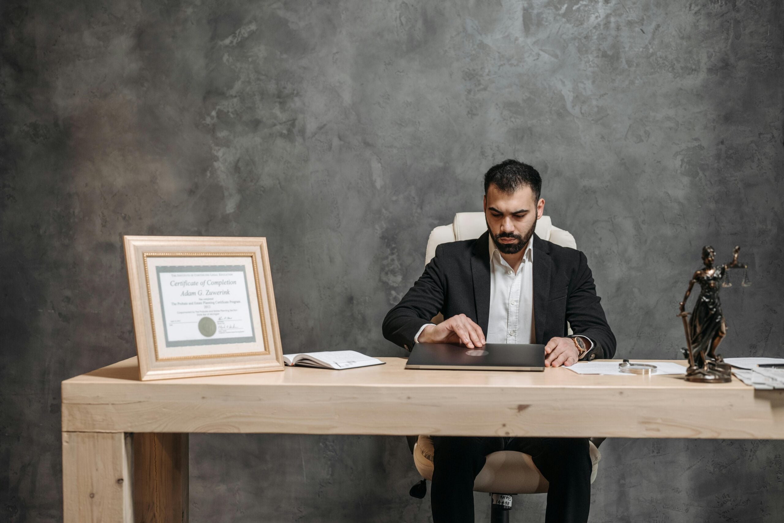 New York Premises Liability lawyer reviewing case documents in office for legal consultation