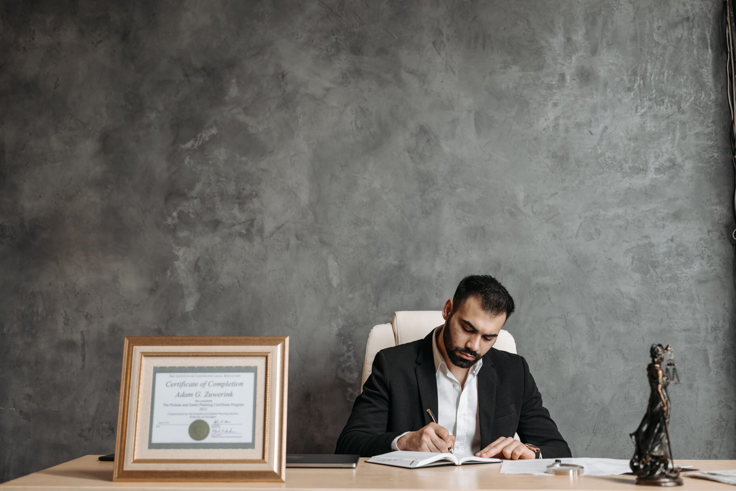 A personal injury lawyer reviewing documents to protect clients' legal rights in NY.