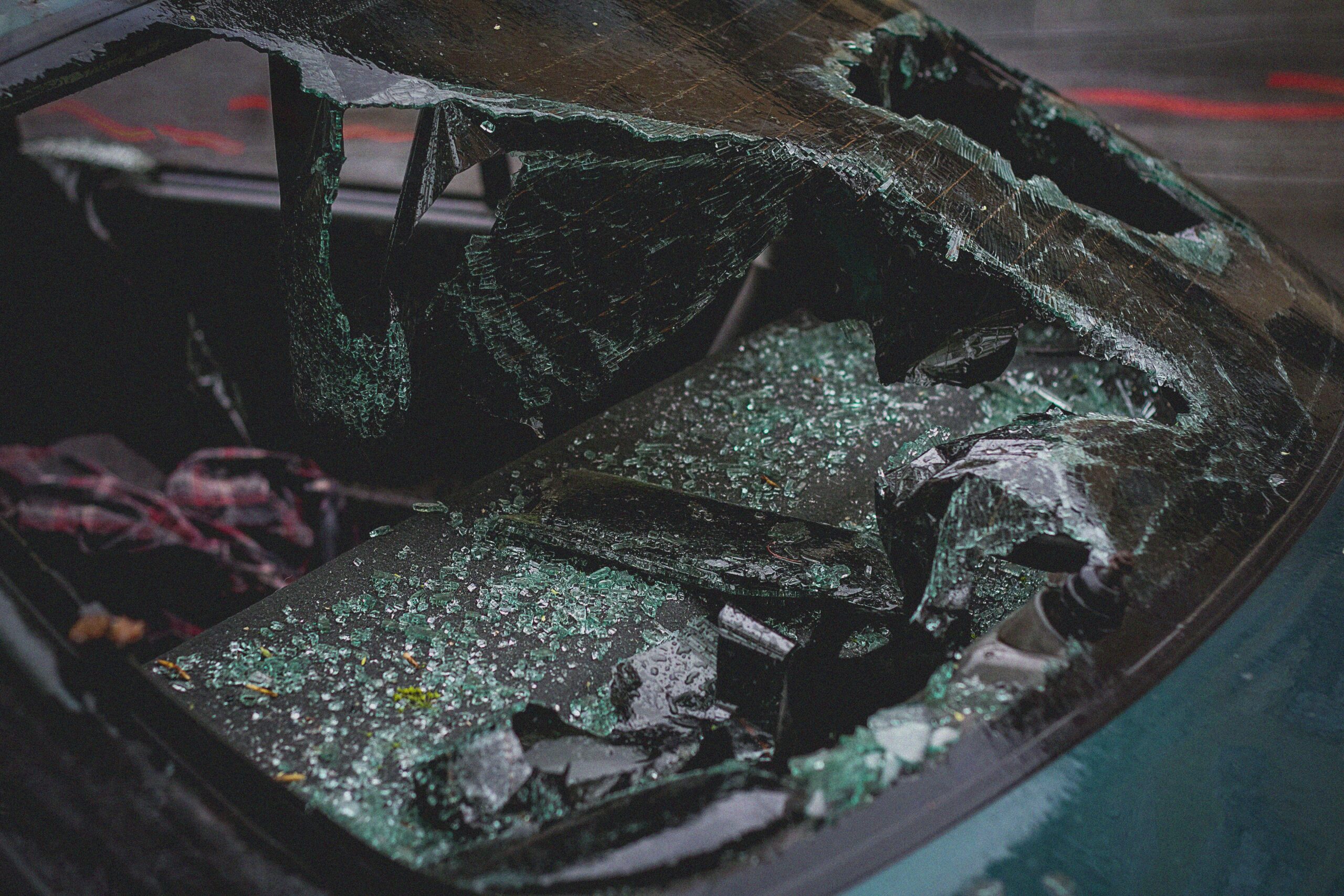 Uninsured Motorist Accident claim involving severe vehicle damage and shattered glass.