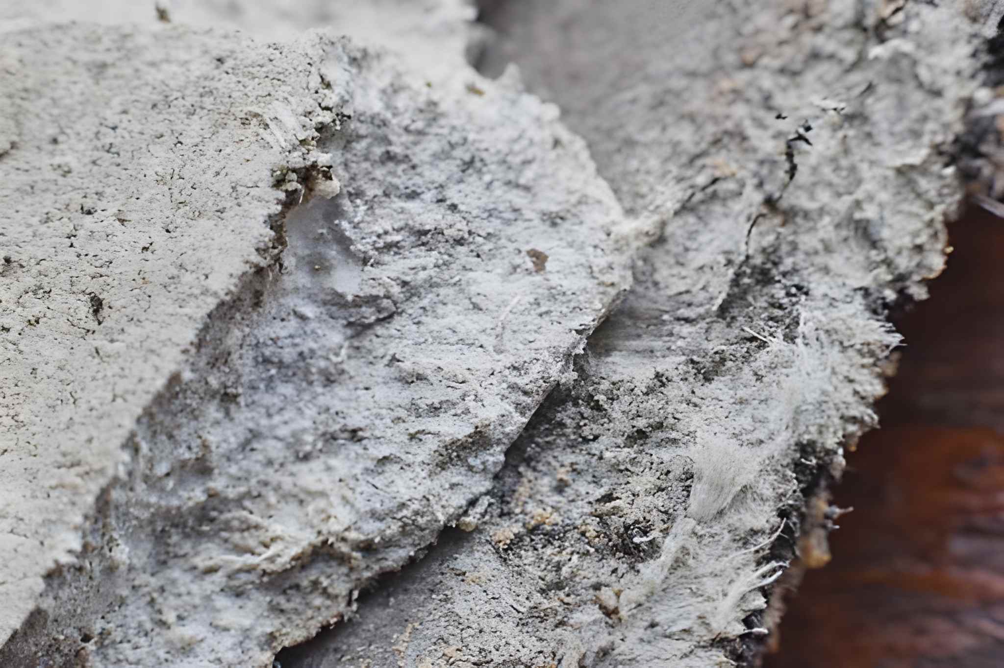 roof covering material with asbestos fibres